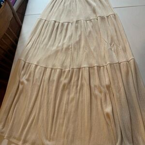 Beautiful cream ribbed midi skirt.  Excellent condition. Worn few times. Like ne